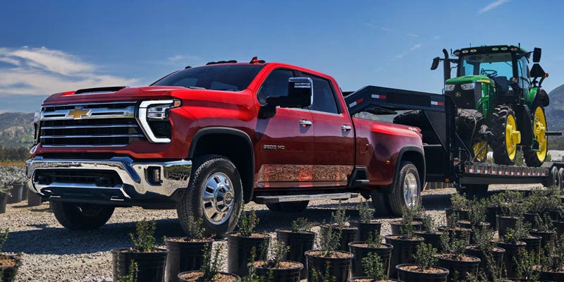 Chevrolet Silverado 3500 HD towing large equipment