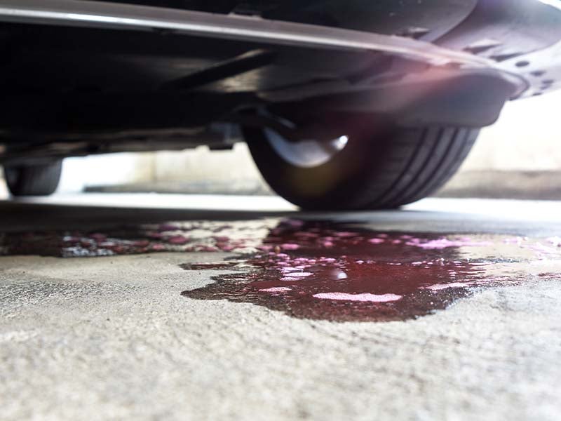 Transmission fluid leak under a vehicle